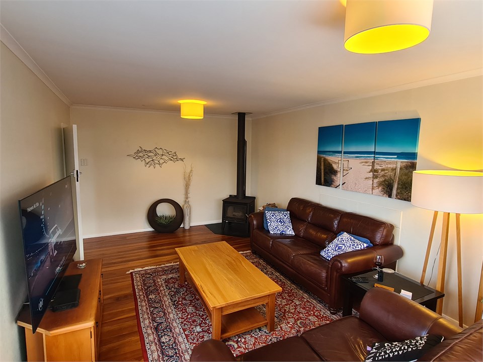 Firebox in living room with dry wood for winter