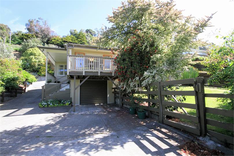 Off Street Parking Area & Fully Fenced Front Yard