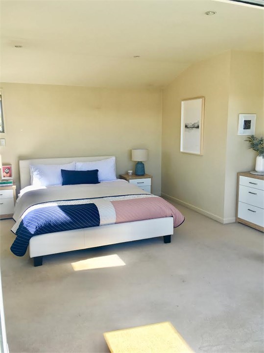 Master bedroom has ensuite bathroom and deck