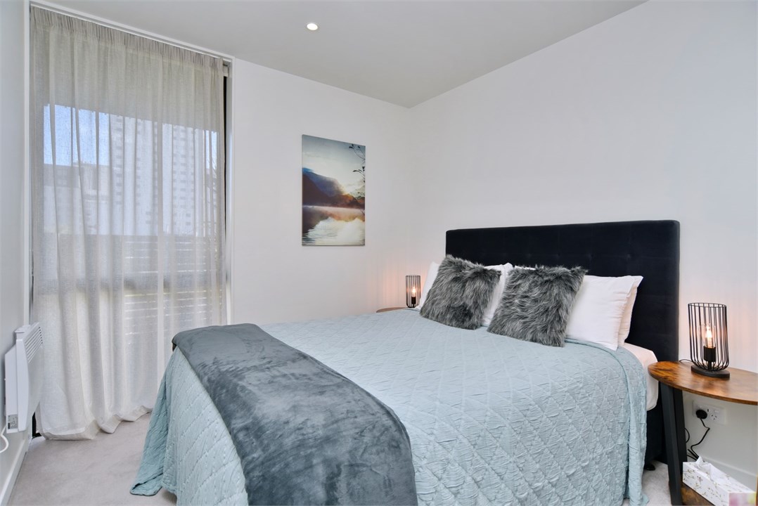 Bedroom 2 has a Queen bed