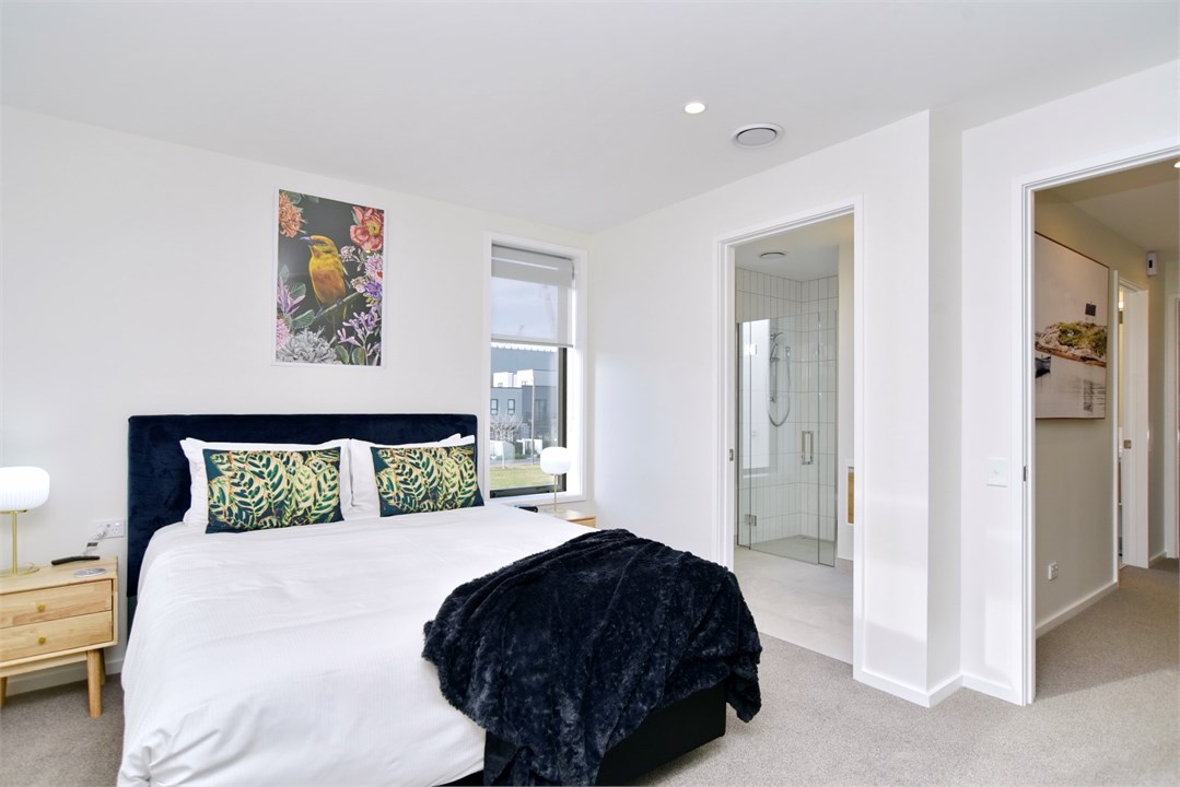 Bedroom 1 has a King bed, TV and an ensuite