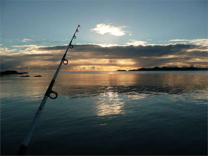 Fish off the rocks at sunrise.