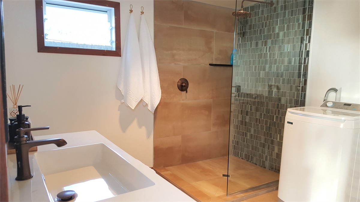 Shower Area with Washing Machine