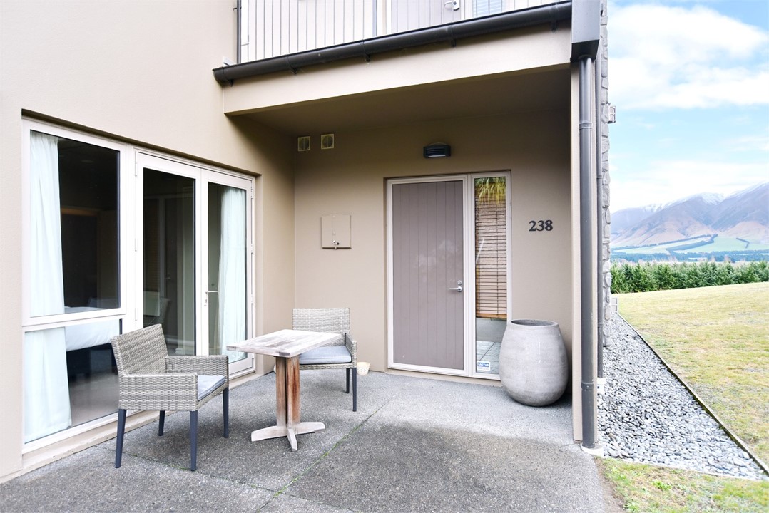 Outdoor sitting area with a view of the mountains