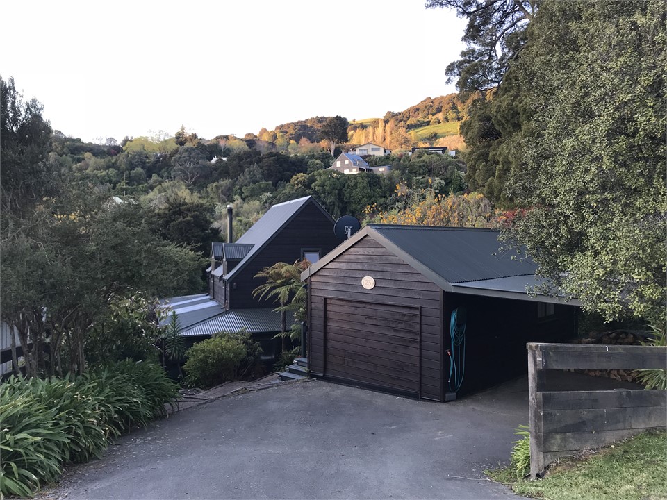 Sleep out and carport from road
