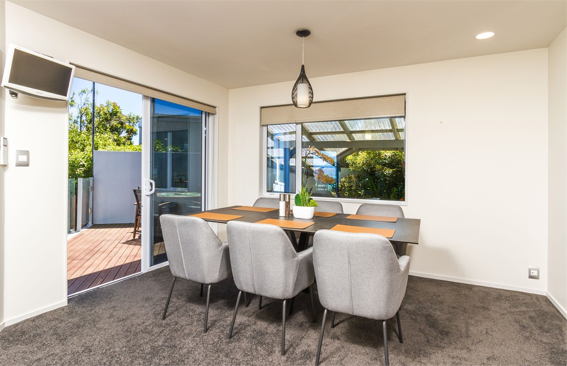 Dining area opening to deck