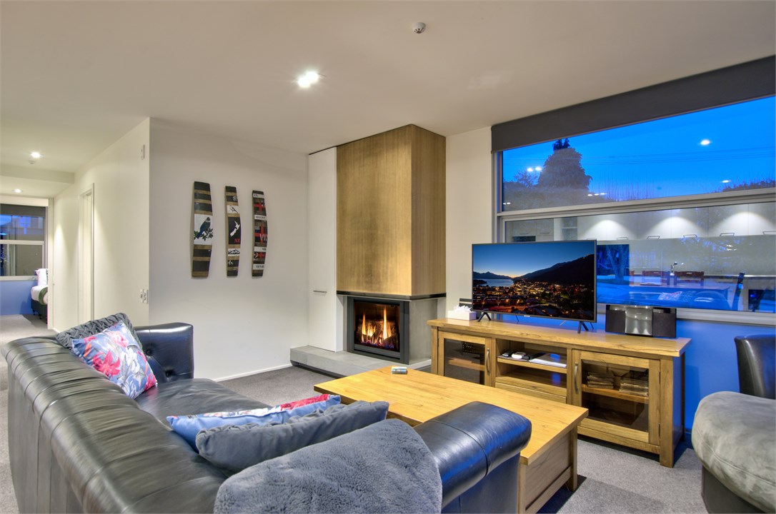 Lounge area showing hallway to bedrooms.
