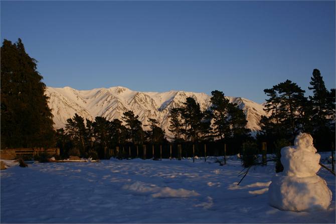 Snowman and sun rising on Mt Hutt