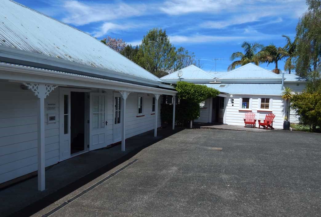 Dining room and reception (left) and back door to 