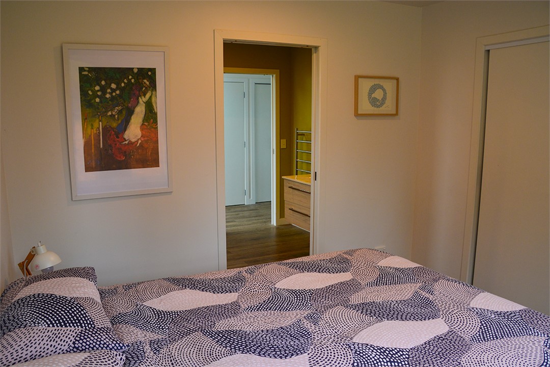 Main bedroom through to bathroom