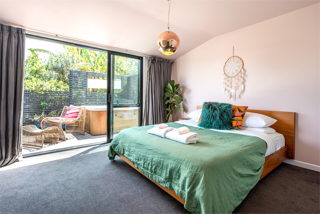Master bedroom leading to spa