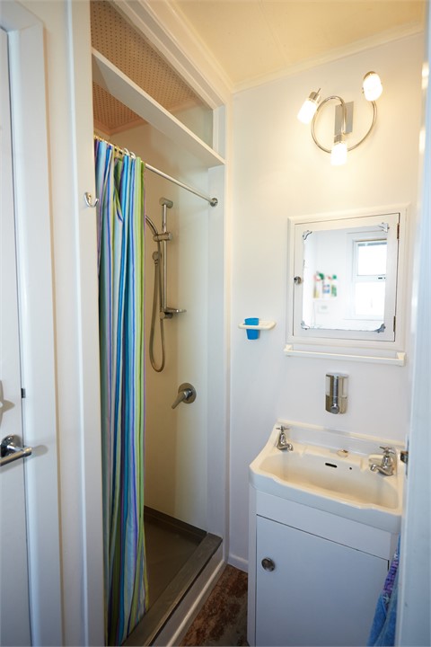 Inside shower, toilet and laundry.