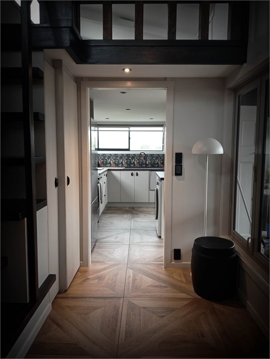 View into the kitchen from lounge