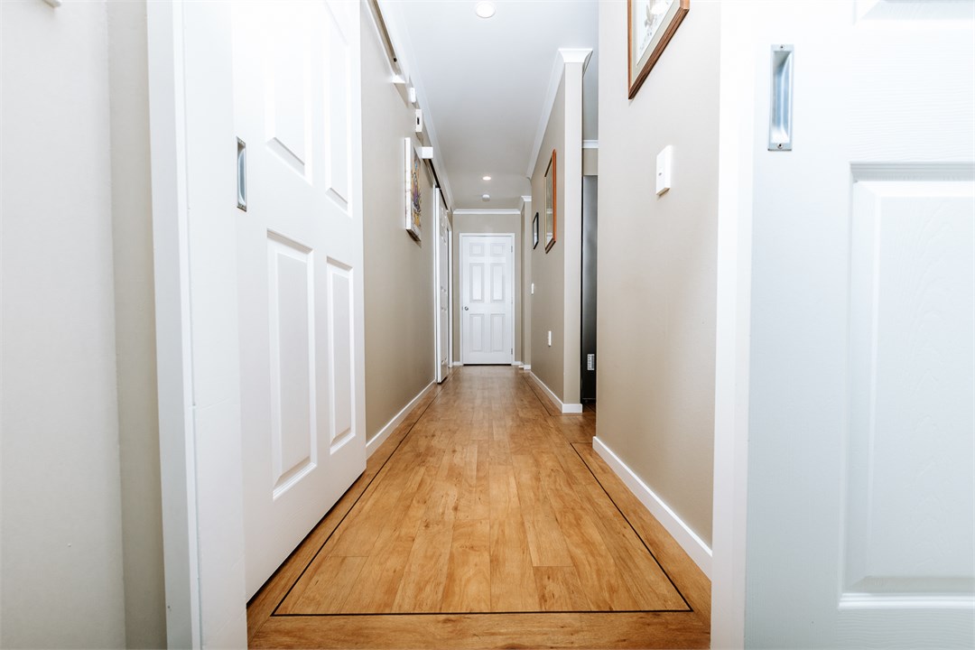 Hallway which leads to integral single garage, 2 b