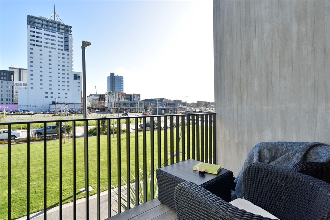 Seating area on the balcony with view of the city