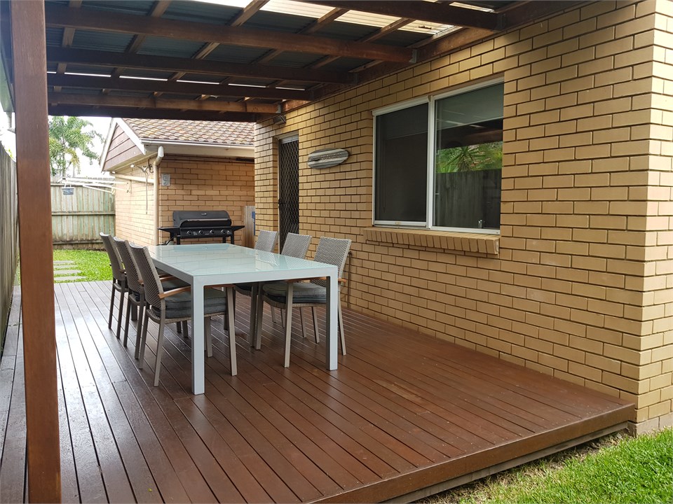 Undercover Rear Deck with Bbq & warm dog shower.