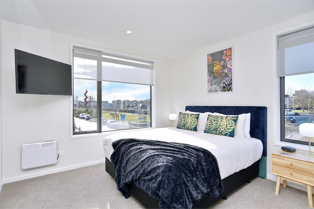 Bedroom 1 has a King bed, TV and an ensuite