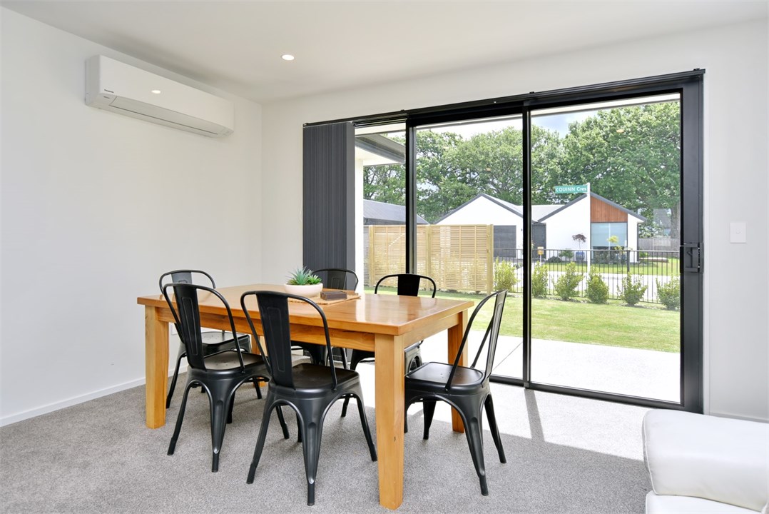 Enjoy meals together at this bright and airy dinin