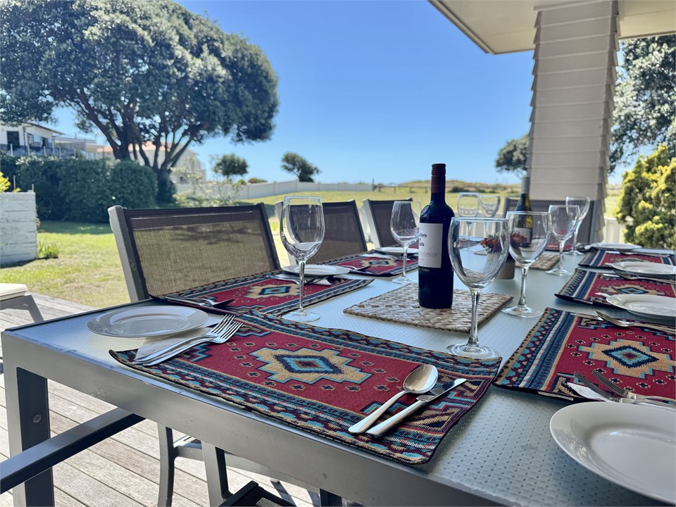 Outdoor dining table and chairs on the deck
