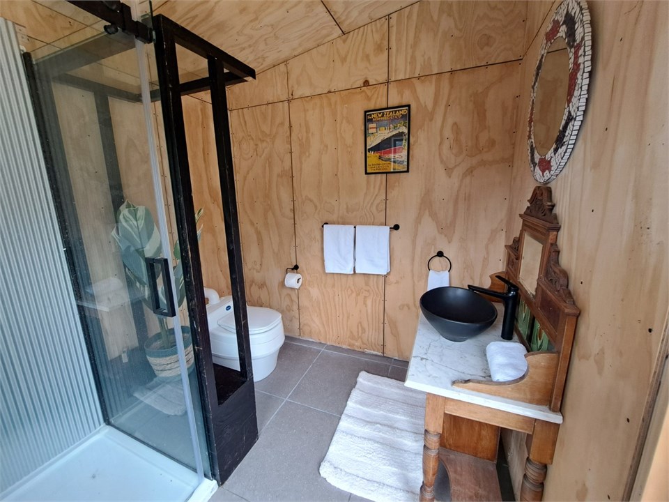 Hot shower, composting toilet, and outdoor bath