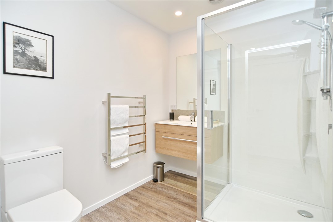 Bathroom contains a shower and toilet