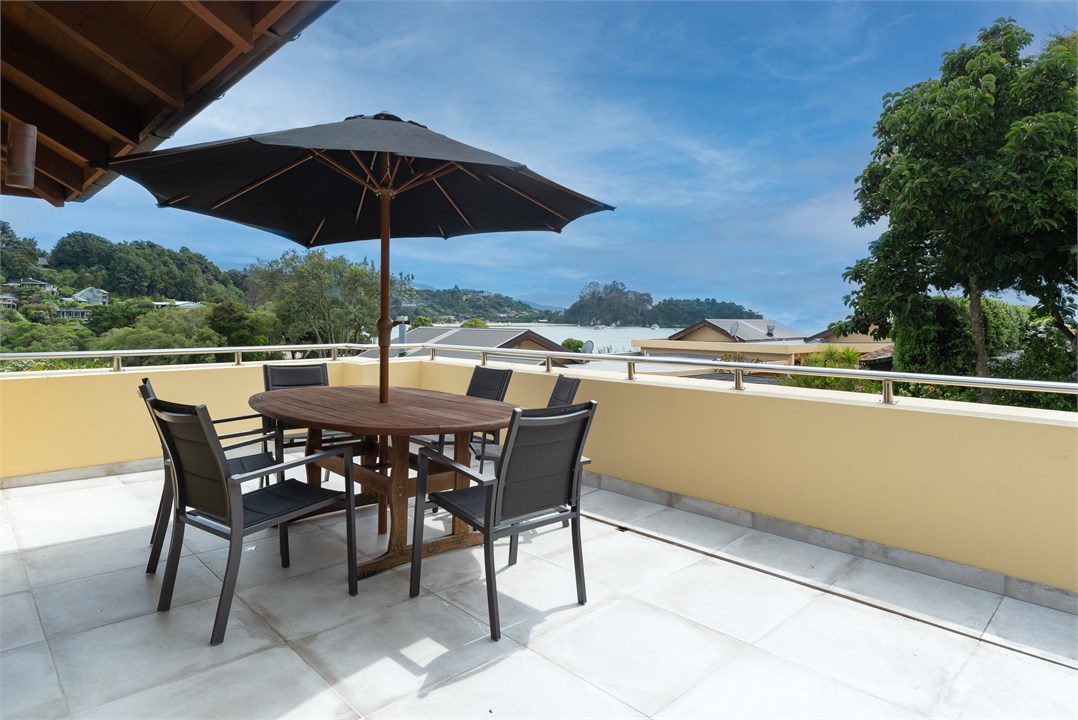 East veranda looking out to the beach and bay