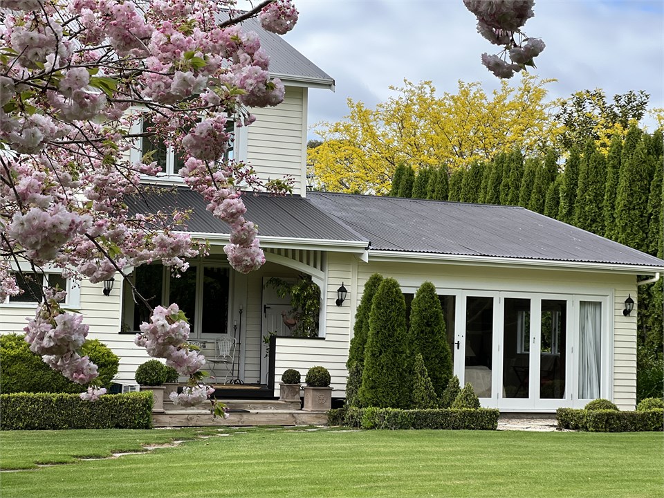 View of studio wing and French doors from garden