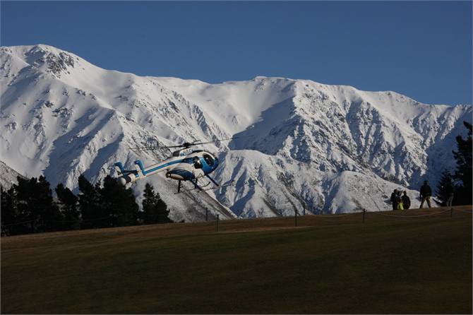 Heliskiing group leaving
