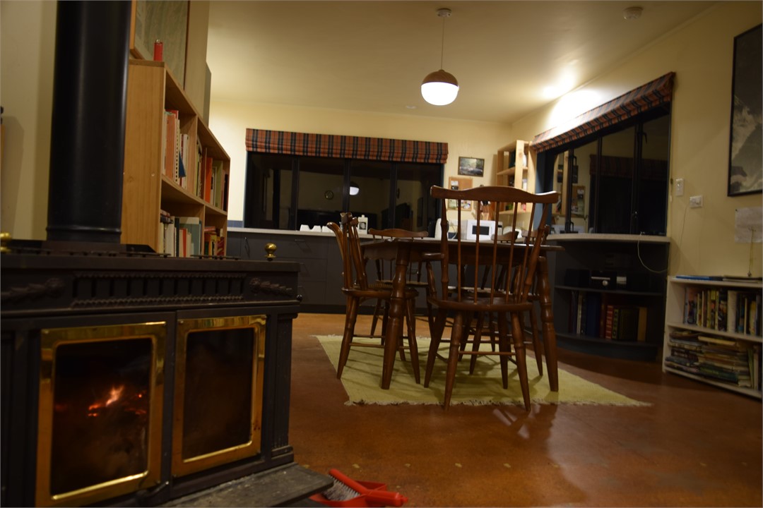 The kitchen at night and with the fire going