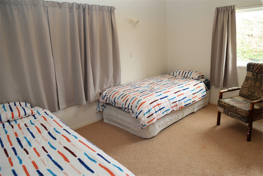 Downstairs twin bedroom with trundler bed