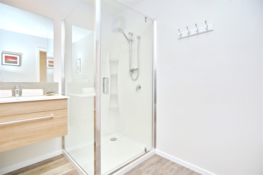 Bathroom with a shower and a toilet