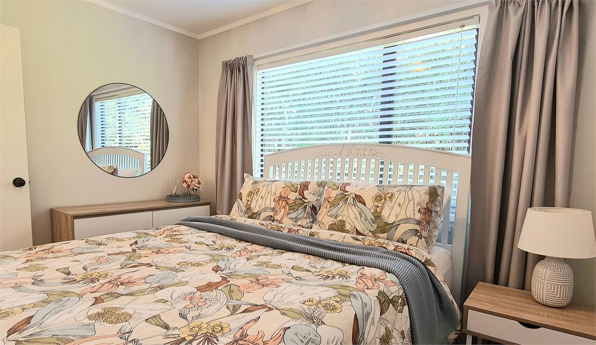 Main bedroom - a comfy queen bed with a bamboo top