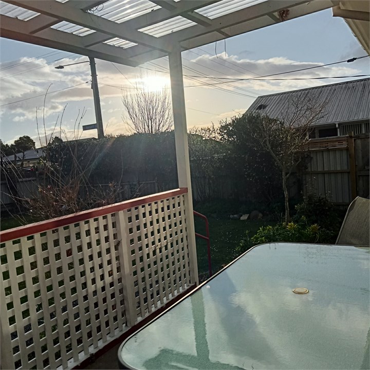 Sitting at the table watching the sun go down