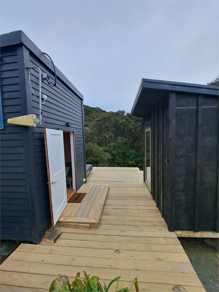 Exterior view of the tiny house and bathroom build
