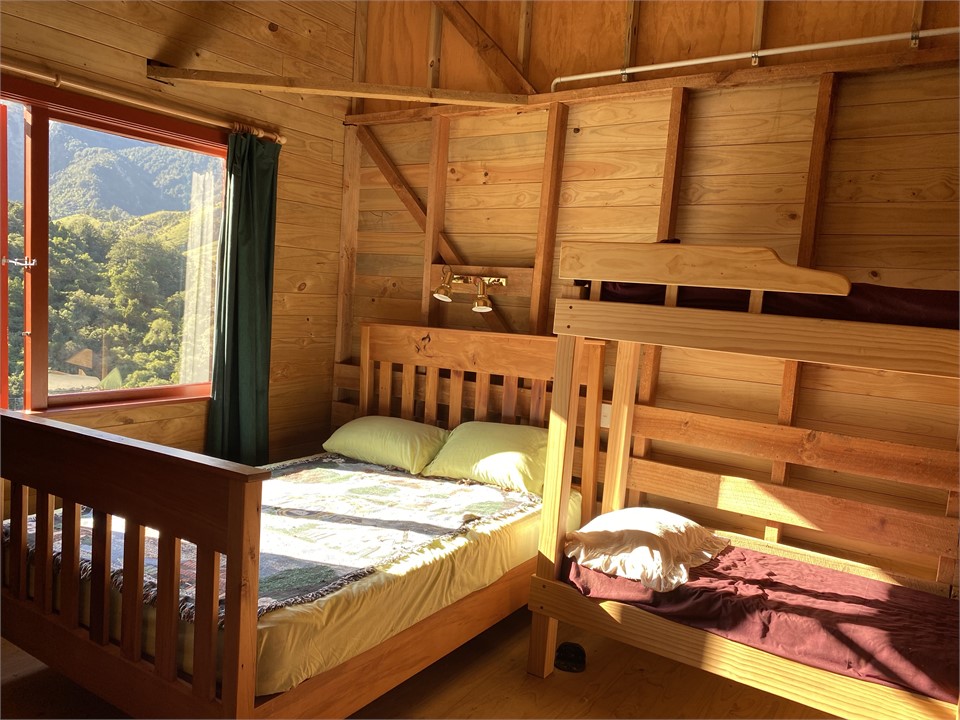 Double bed in bunk room