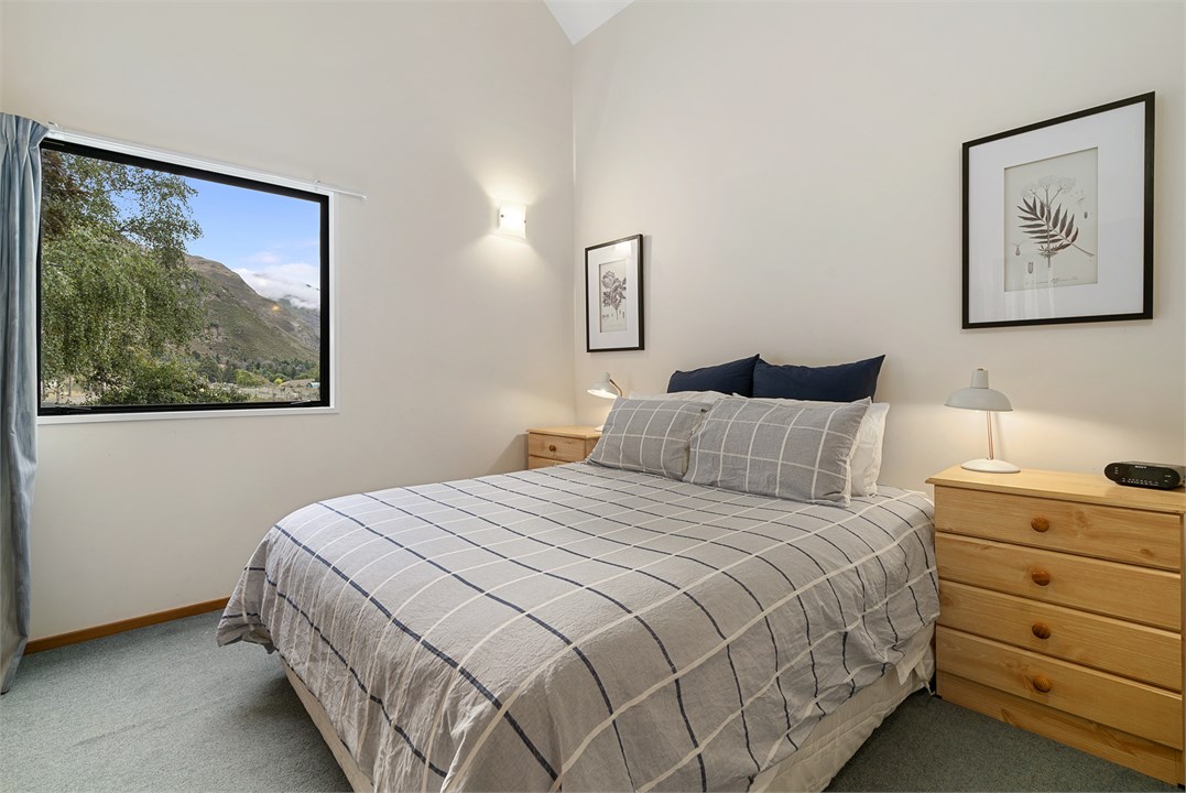 Bedroom 2 has a Queen bed