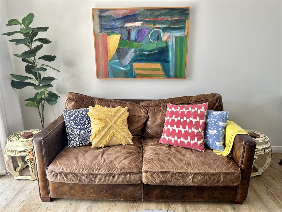 A cosy leather couch in the lounge.