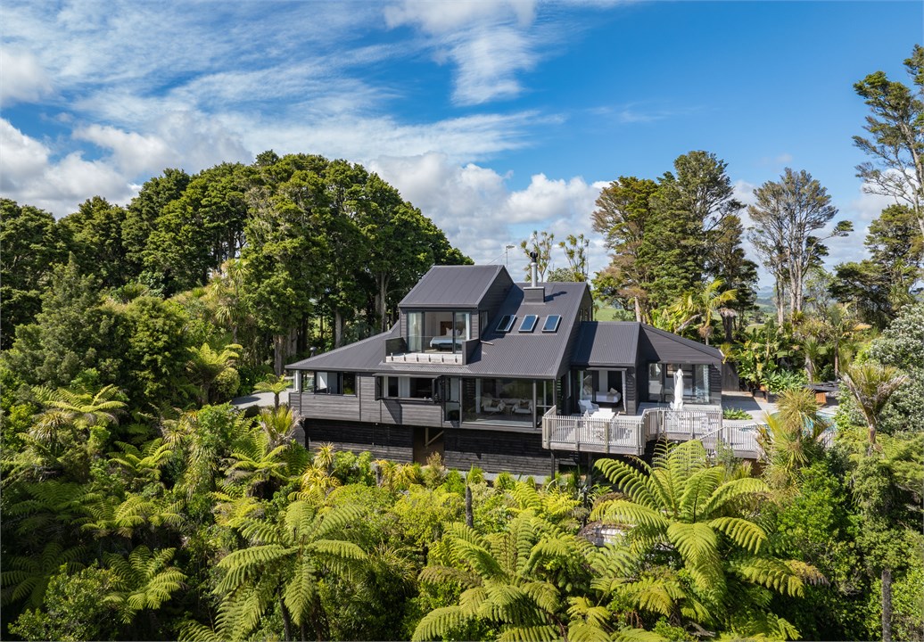 Elevated architectural house with views of Manghaw