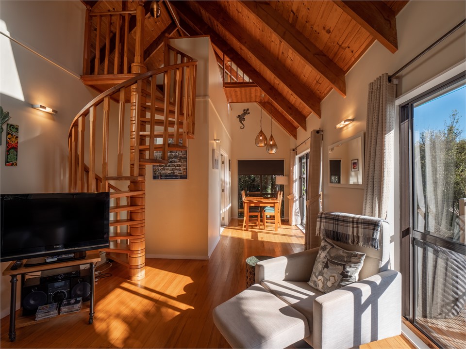 Staircase up to the mezzanine bedroom and down tow