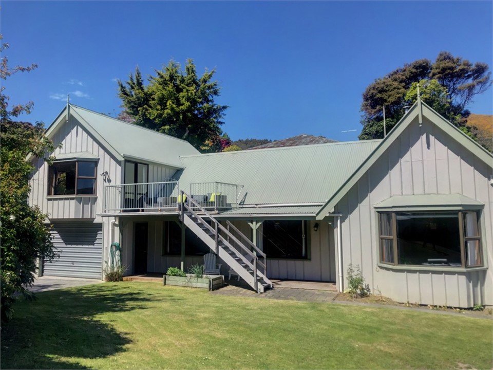 Front of house, plenty of room for parking & play