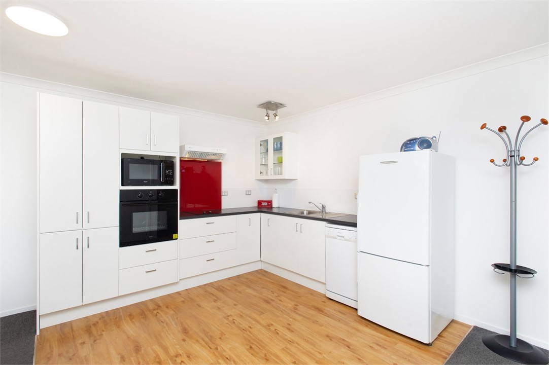 Kitchen includes dishwasher