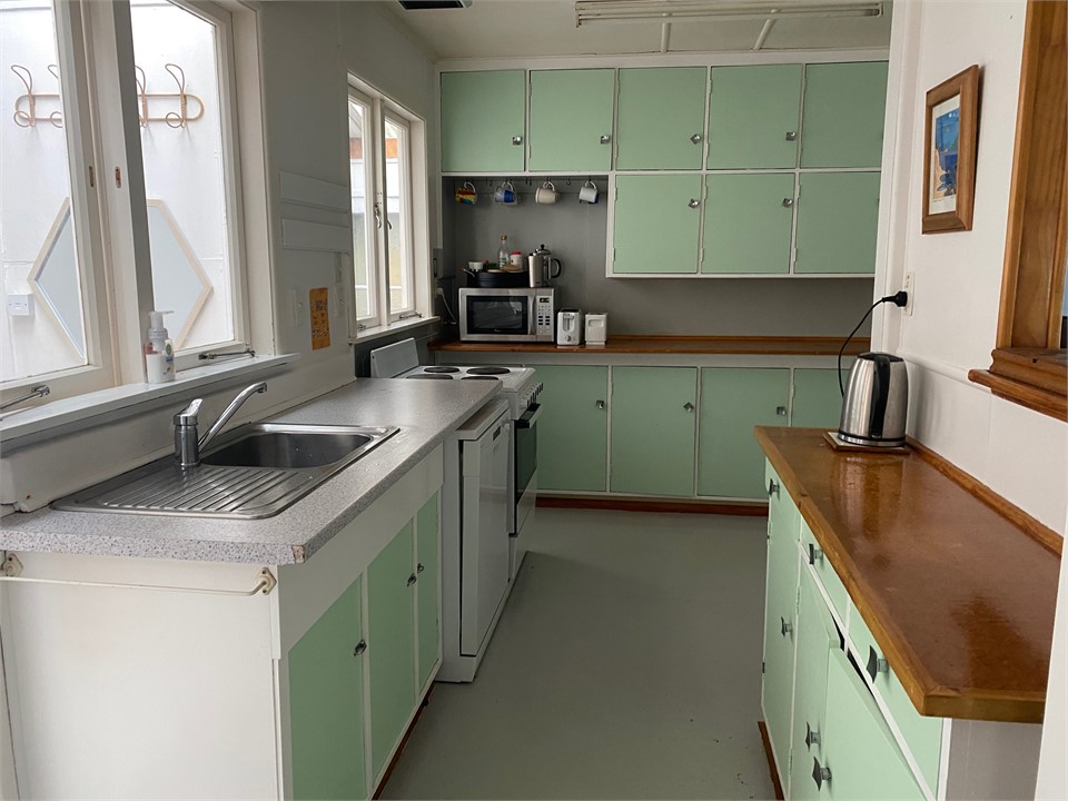 1960's kitchen; full stove, double fridge and dish