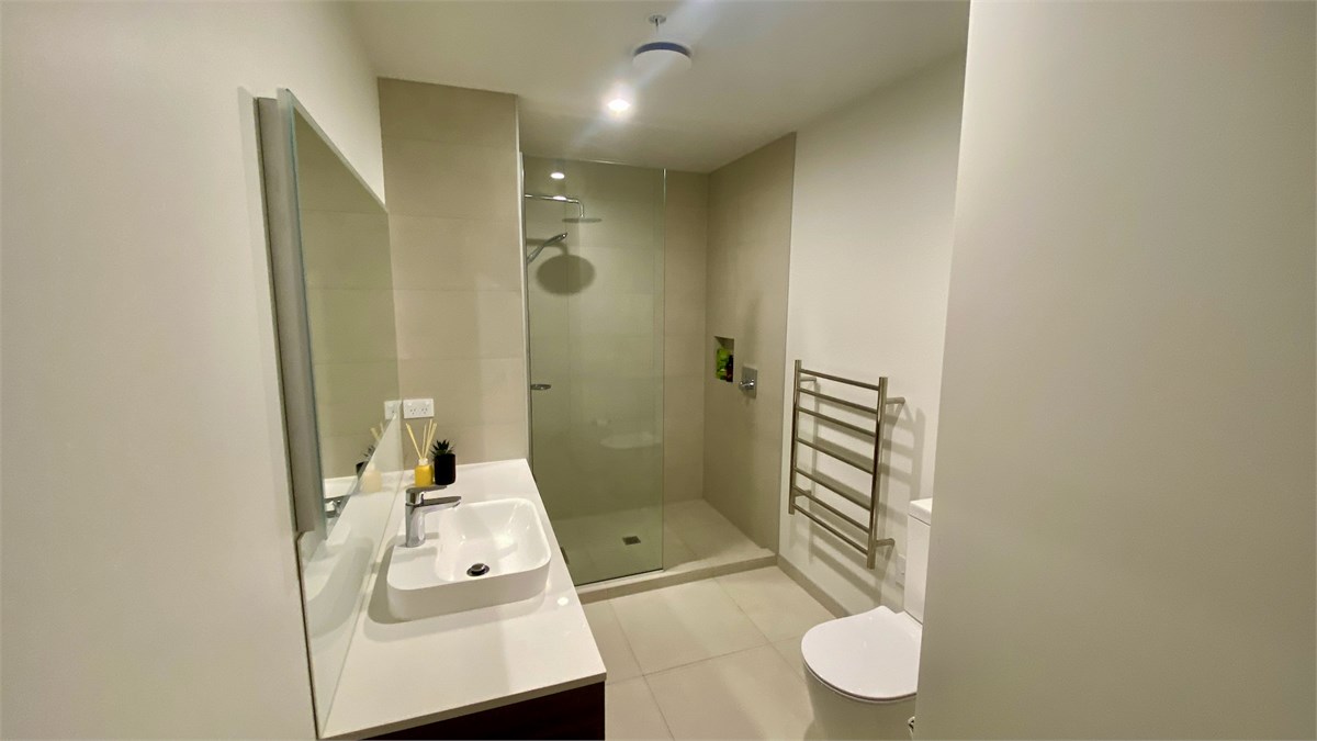 Bathroom with Shower, Vanity & Toilet
