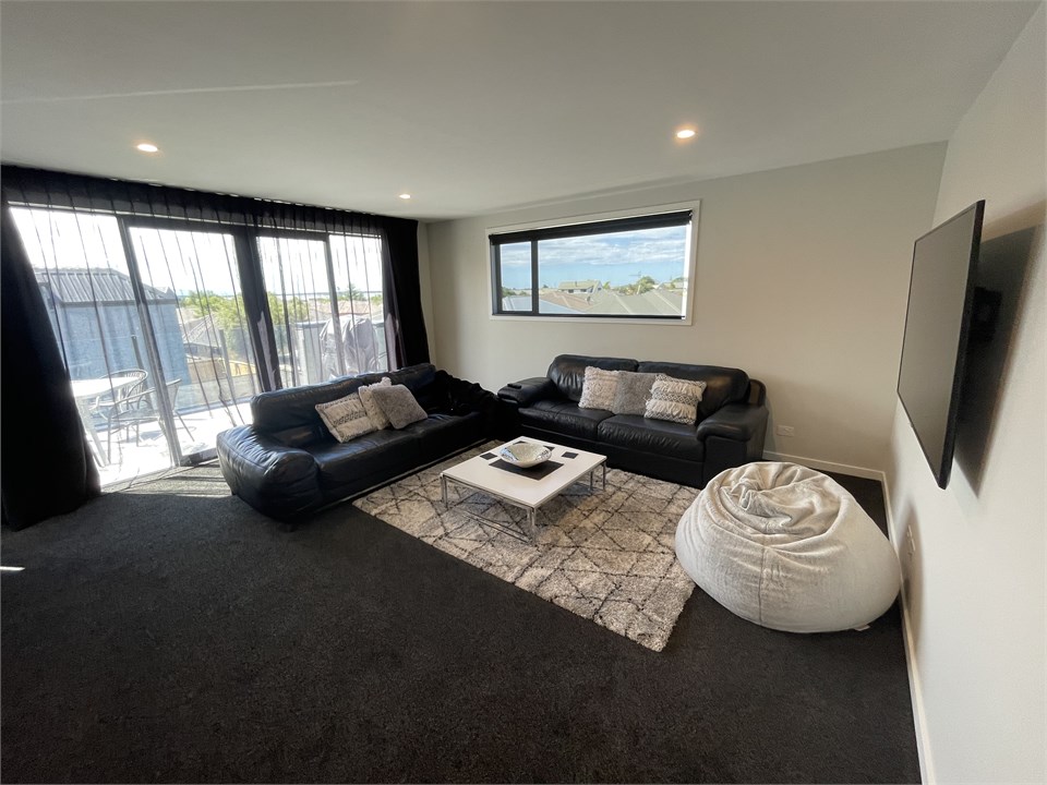 Lounge area with patio in the background