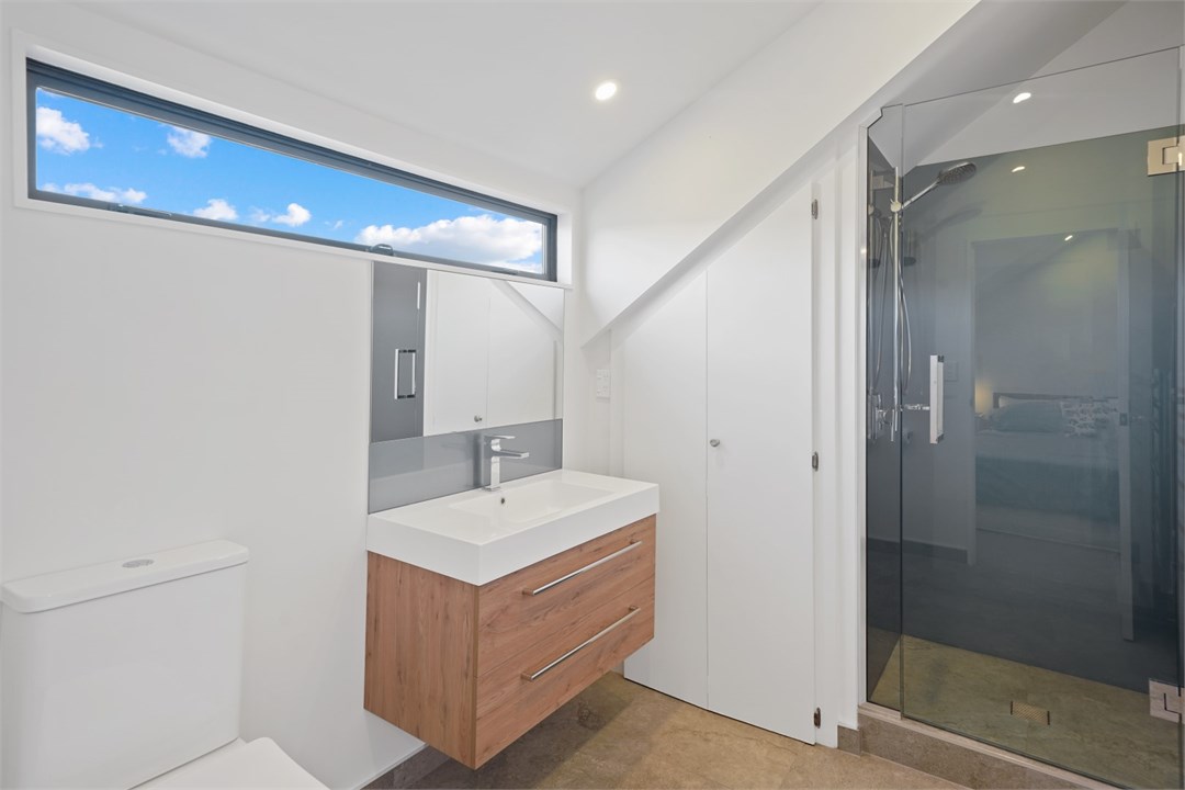 Bathroom 3 has a shower and a toilet