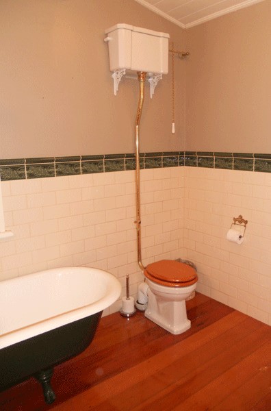 Claw foot bath and pull chain toilet in the queen 