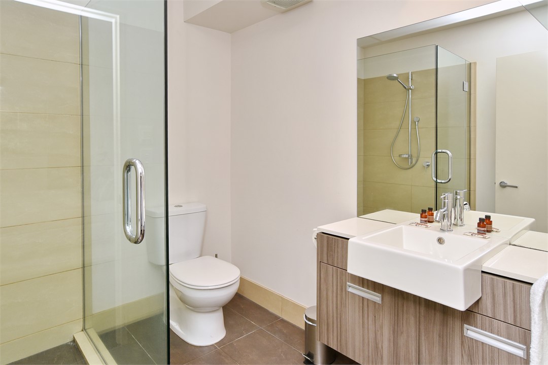 Ensuite bathroom has a shower and a toilet