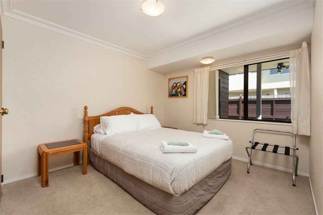 Bedroom two with quality queen bed