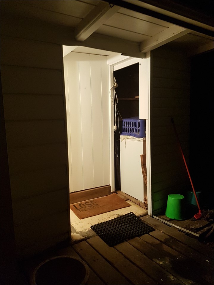 Back door entrance way. Washing machine here, alon