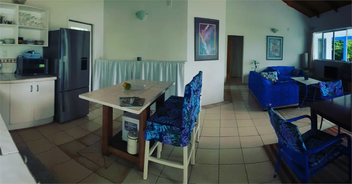 Open plan Kitchen Living and Dining with sea view